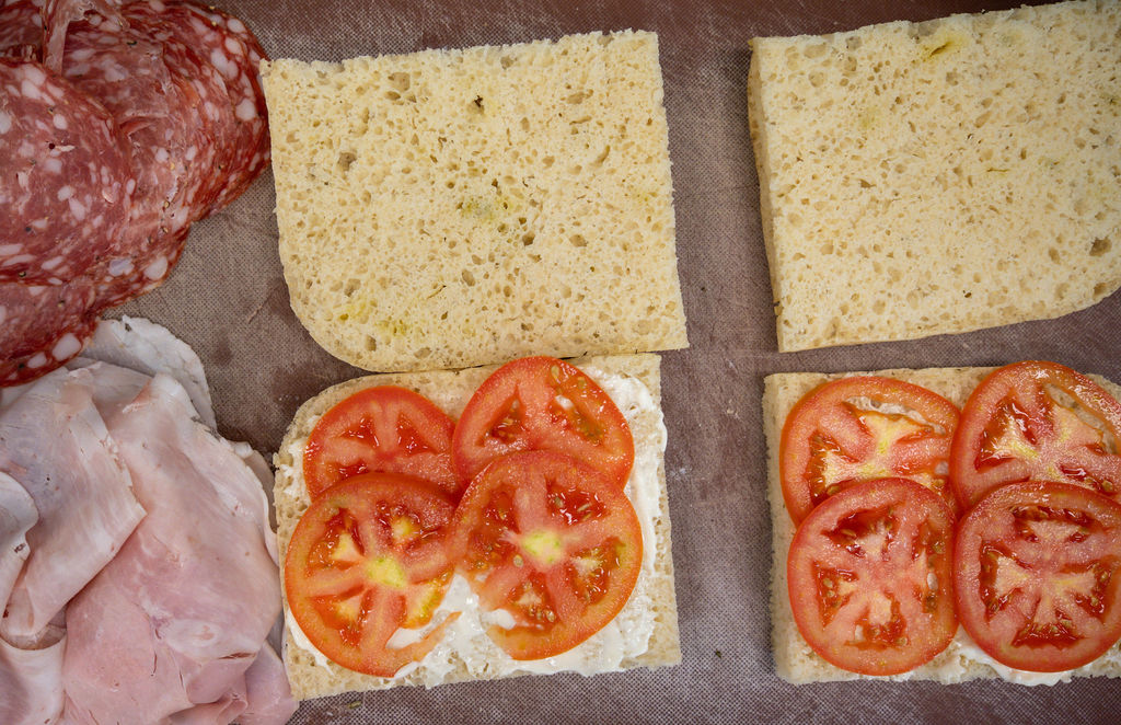 Cured meats, focaccia and fresh tomato