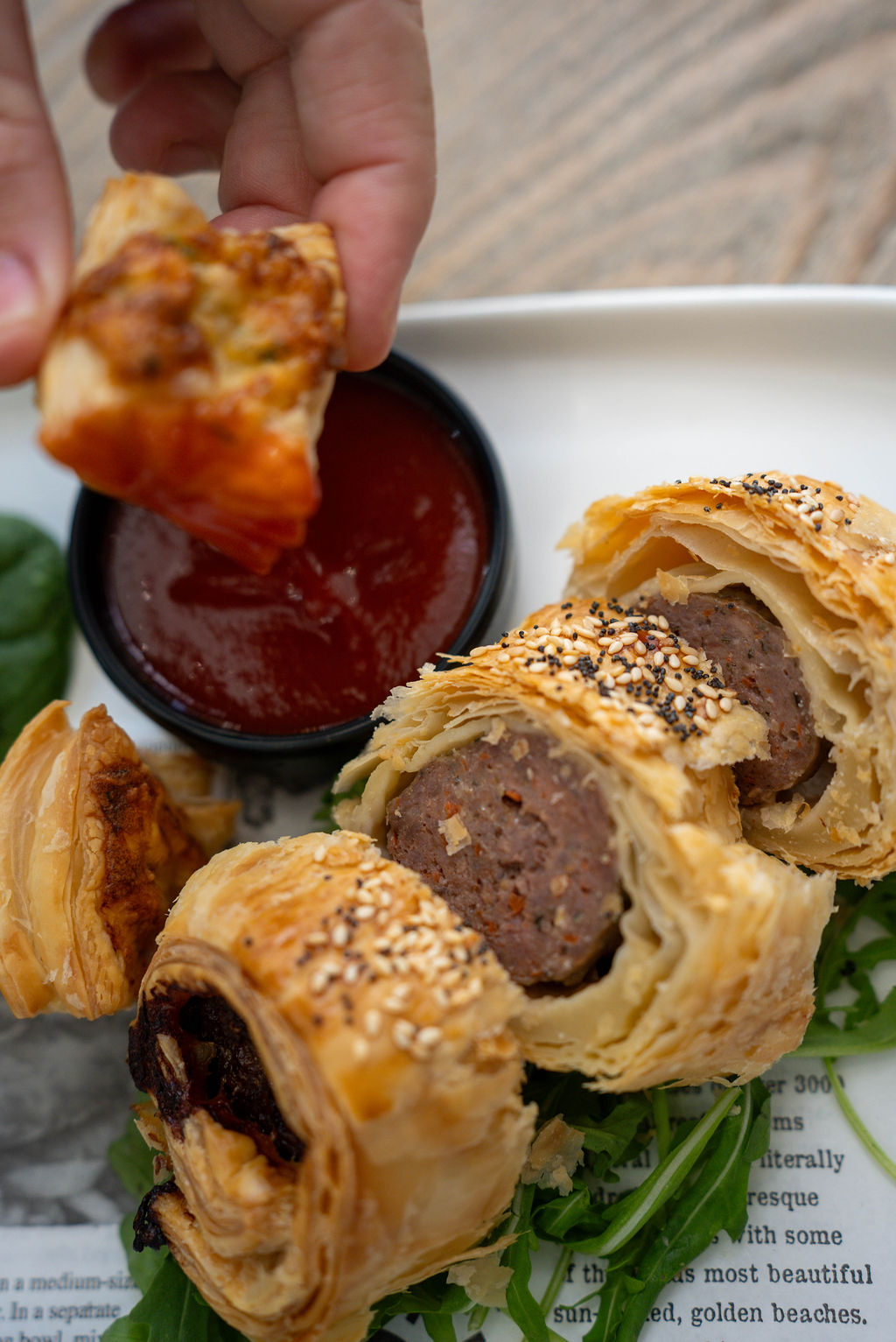 House-made sausage rolls with sauce